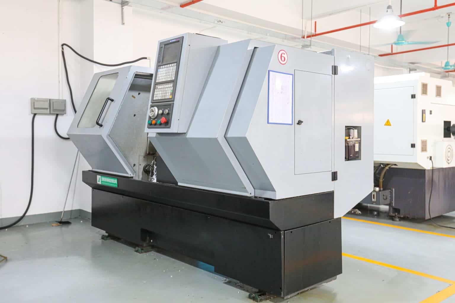 Modern CNC machining center inside the 6CNC production facility