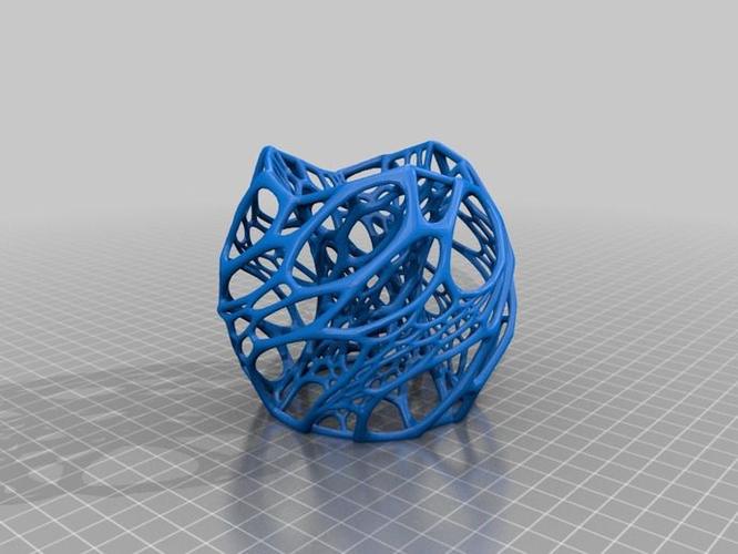 A complex blue lattice structure model produced via 3D printing, showcasing advanced manufacturing technology.
