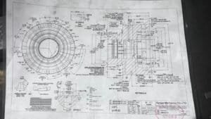 High-precision CNC machined metal part technical drawing with detailed dimensions.