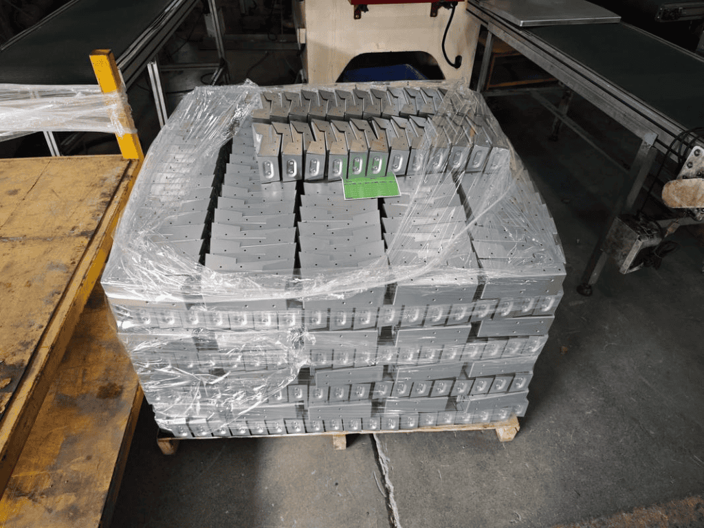 Custom CNC machined metal parts ready for assembly and quality testing.