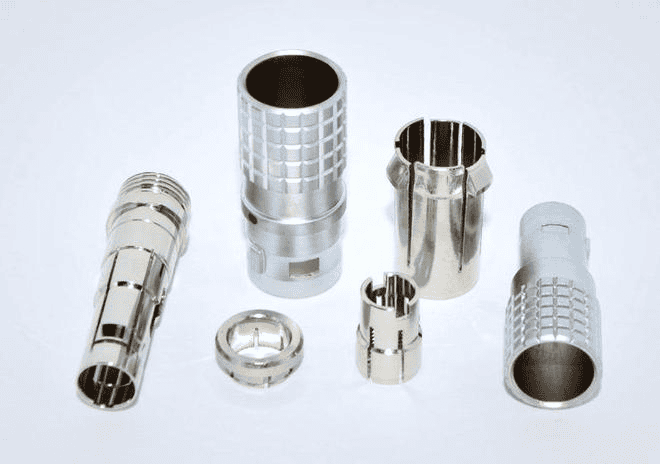 High-precision CNC machined metal parts with intricate designs and smooth finishes.