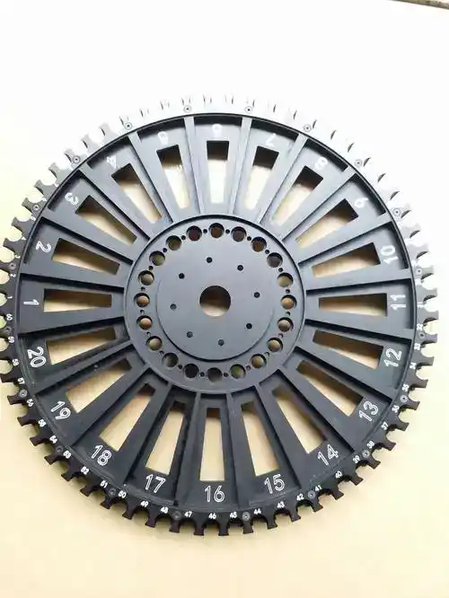 Precision CNC machined gear wheel with detailed teeth and numbered markings for industrial applicati.