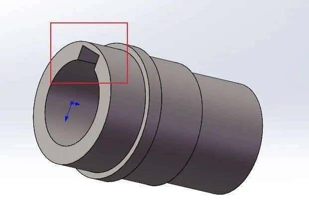 CNC machined metal component with precise internal and external features.