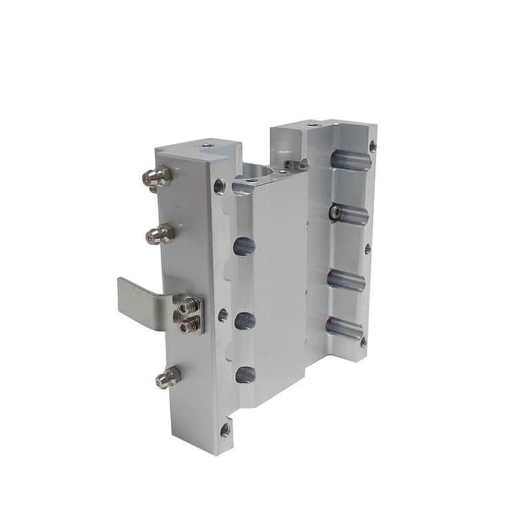 Precision CNC machined metal component with multiple mounting points and features.