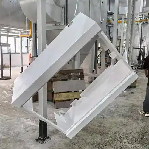 Custom white CNC machined metal enclosure with angled design.