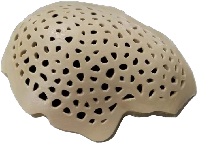 Component with a detailed hole pattern.