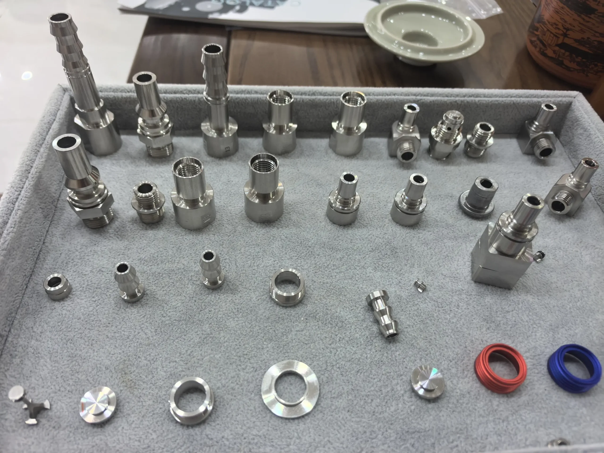 Precision Swiss turned fittings with threads and small passages