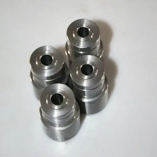 Turned mechanical components with axial bores