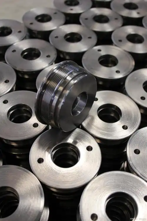 Batch of turned tool steel components; exact grade follows the drawing