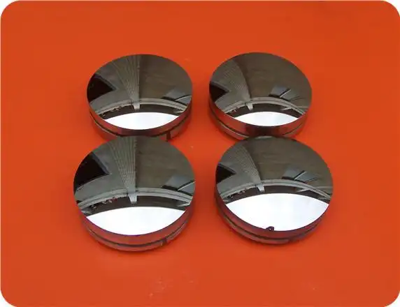 Polished circular metal surfaces