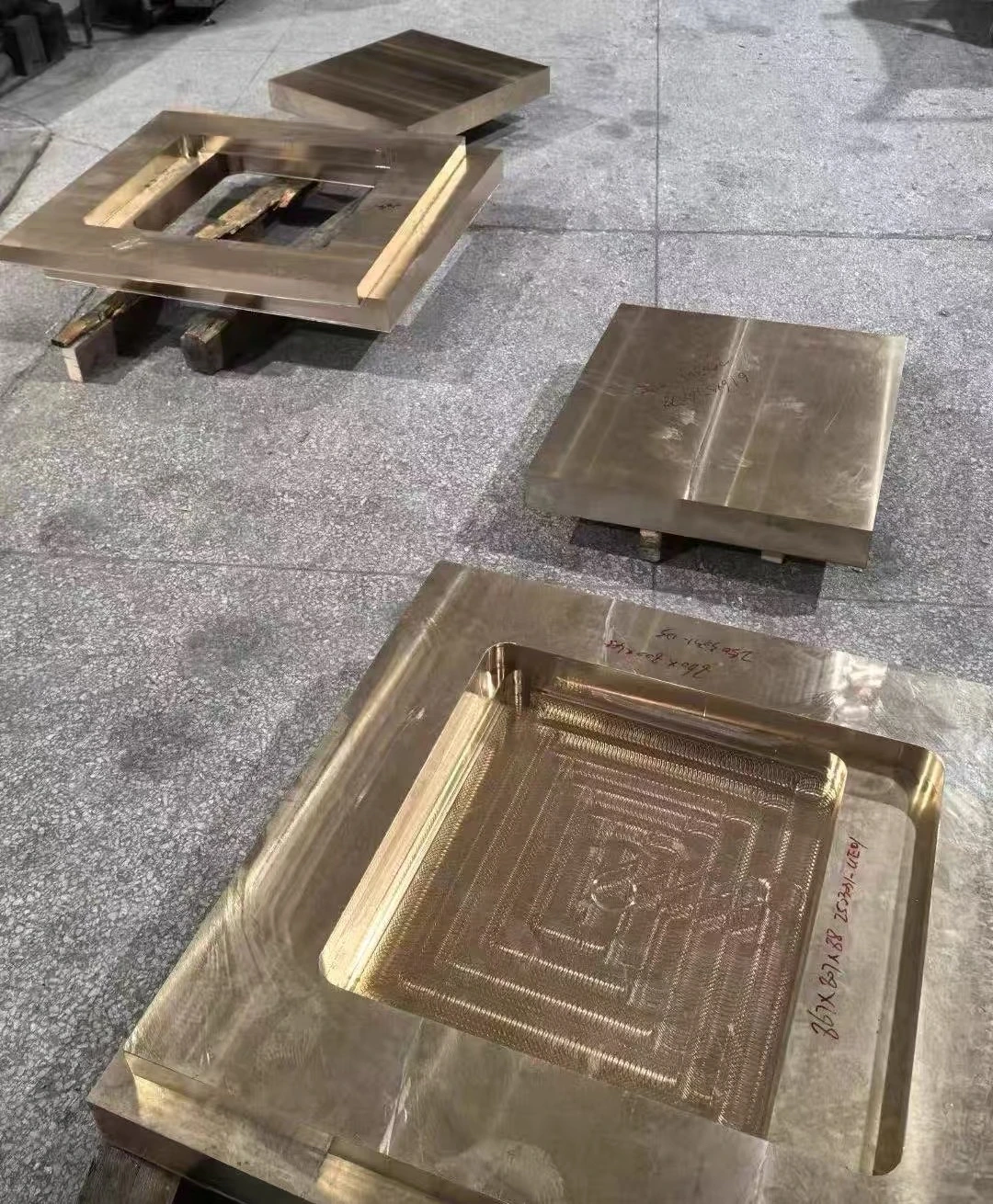 Bronze plates with milled pockets
