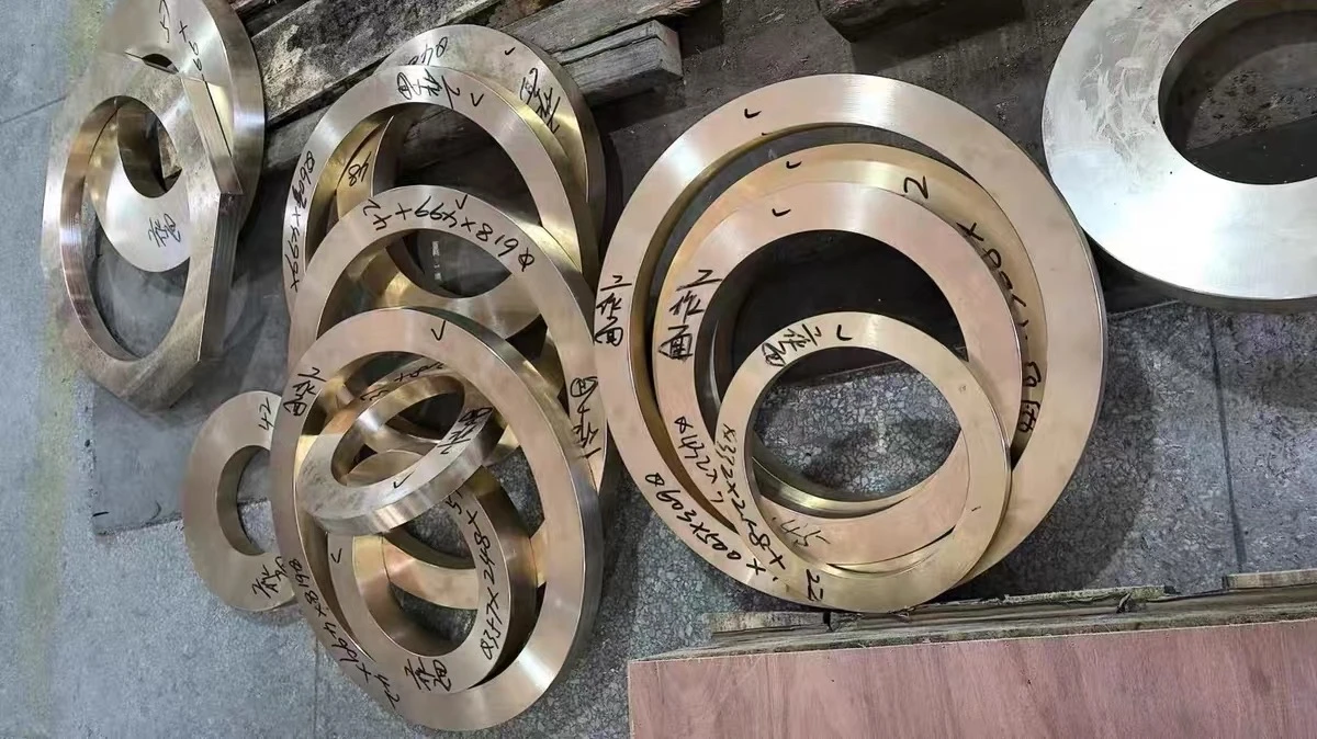 Machined bronze rings and sleeve components
