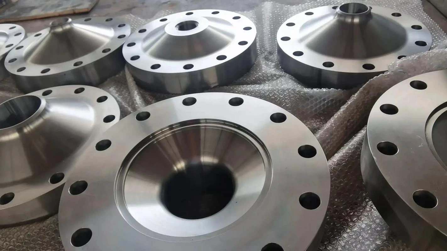 Machined nickel alloy flanges with bolt circles