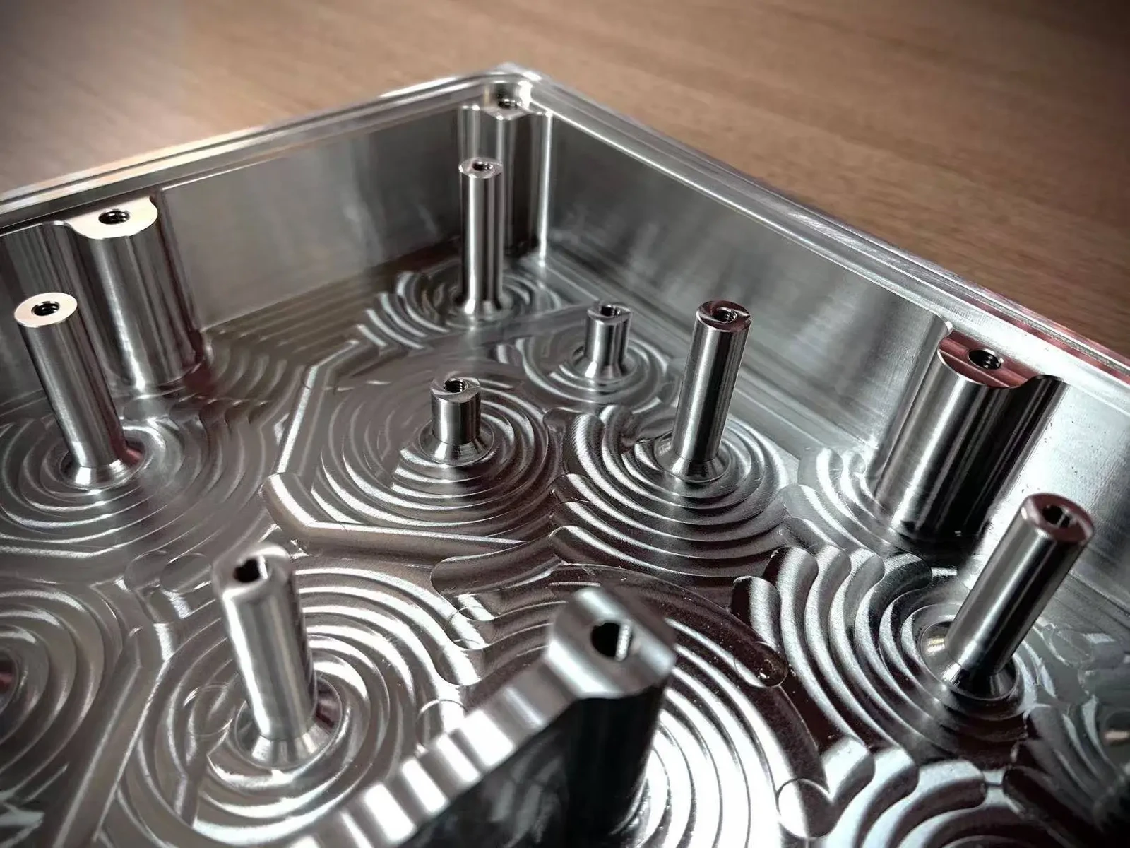 Milled nickel alloy plate with pockets and slender features
