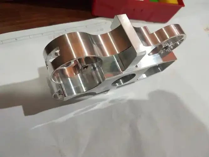 Machined nickel alloy component with contoured profiles