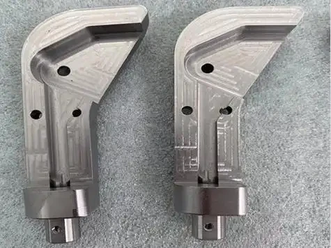 Machined titanium brackets with pockets and mounting holes