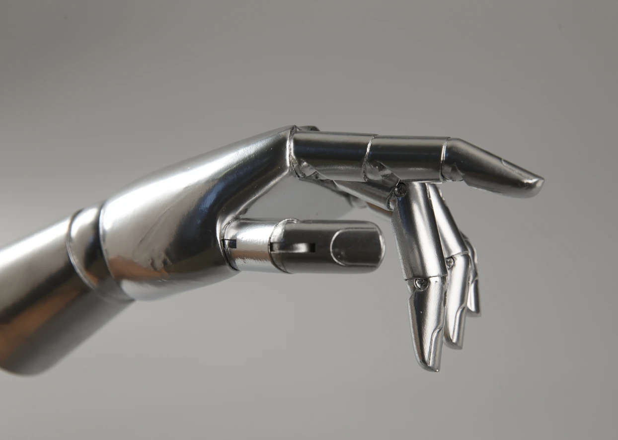 Articulated metal hand illustrating precision robotic mechanisms